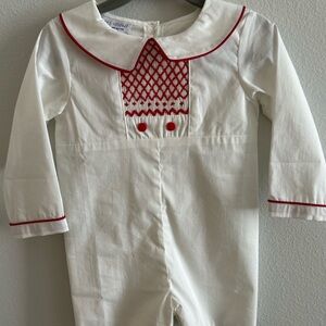 Pleats and Stitches Classic White One-Piece Romper with Red Smocking